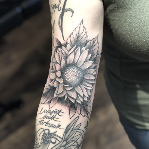 Explore female tattoo placement ideas, creative tattoo ideas in Loveland, available at R&G Body Art