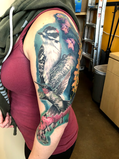 Explore mom and daughter tattoos ideas, creative tattoo ideas in Lakeville, available at SharkTooth Tattoo & Gallery