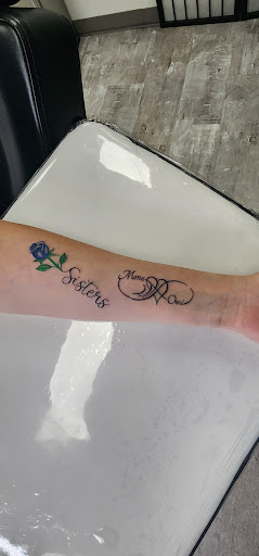 Explore name tattoo ideas for men, creative tattoo ideas in Arlington Heights, available at Space Cat Tattoo