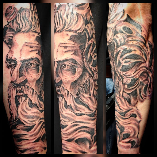 Explore scale tattoo ideas, creative tattoo ideas in Gadsden, available at Sacred Art Tattoo Company