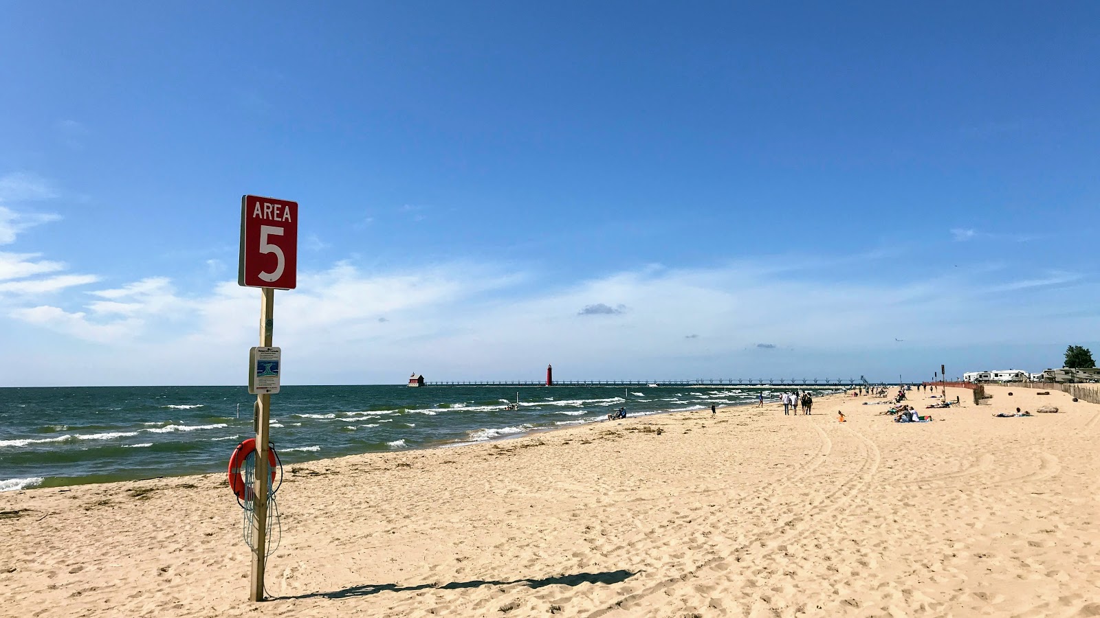 Photo of Grand Haven City Beach with bright sand surface