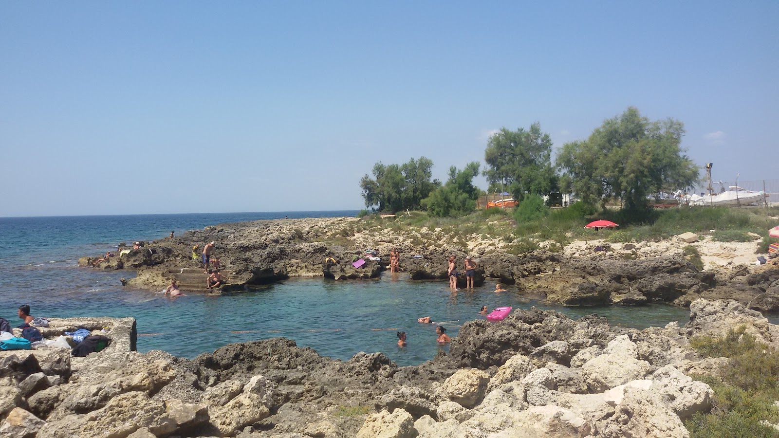 Photo de Spiaggia di Posto Vecchio avec un niveau de propreté de partiellement propre