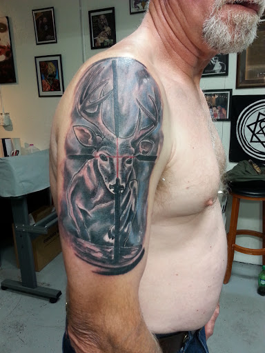 Explore fear god tattoo ideas, creative tattoo ideas in Spencer, available at Ink Envy Tattoo And Body Piercing