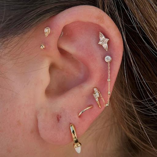 Explore bodybuilding tattoo ideas, creative tattoo ideas in Edison, available at Black Moon Piercing