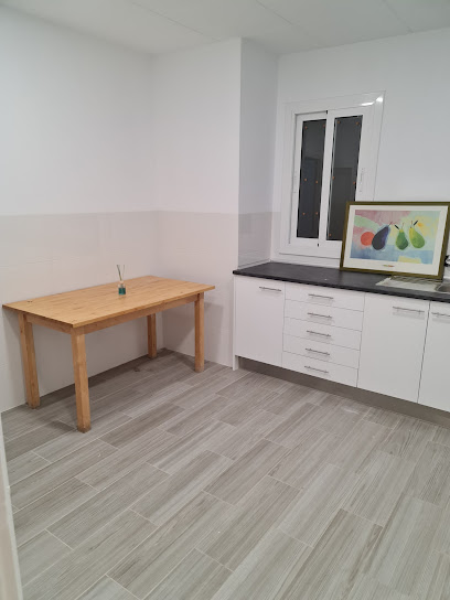 Inmobiliaria Finques Une.1984