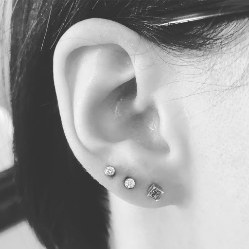 Find small tattoo ideas for friends for your next unique tattoo in Palm Harbor at Angry Owl Tattoo and Piercing