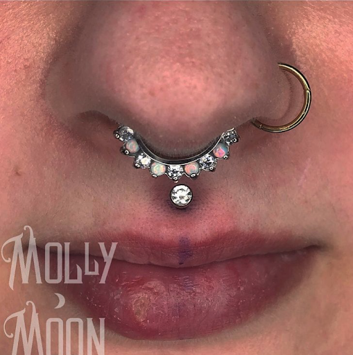 Explore strong woman tattoo ideas, creative tattoo ideas in Oshkosh, available at Piercings by Molly Moon at 920 Tattoo and Piercing