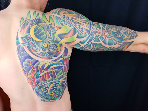 Explore american flag forearm tattoo ideas, creative tattoo ideas in Powell, available at Hummingbird Tattoo Studio