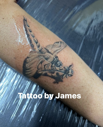 Explore paw tattoo ideas, creative tattoo ideas in Warner Robins, available at Untold Pain Tattoo Studio