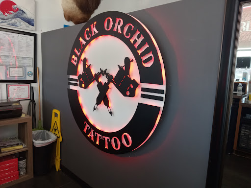 Explore july birth flower tattoo ideas, creative tattoo ideas in Pigeon Forge, available at Black Orchid Tattoo Studio