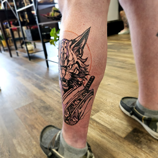 Explore unique breast cancer tattoo ideas, creative tattoo ideas in Traverse City, available at Pinups & Needles