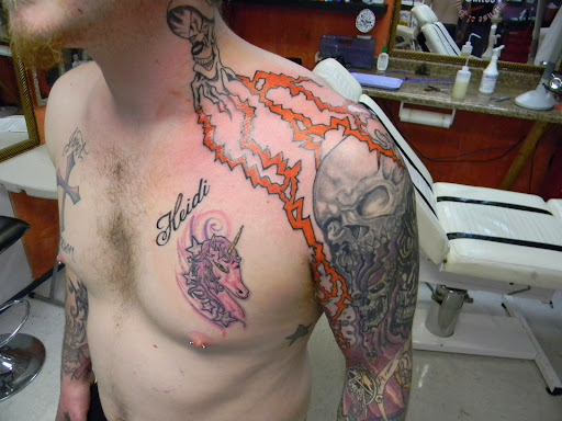 Explore dark cover up tattoo ideas male, creative tattoo ideas in Rockford, available at House Of Pain Tattoo co.