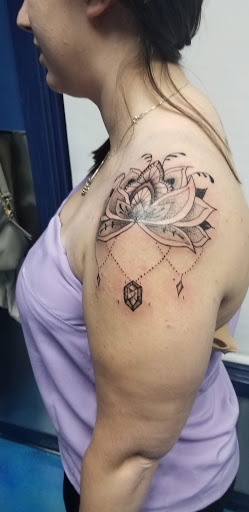 Explore naked women tattoo ideas, creative tattoo ideas in North Aurora, available at Ink Bar Tattoo