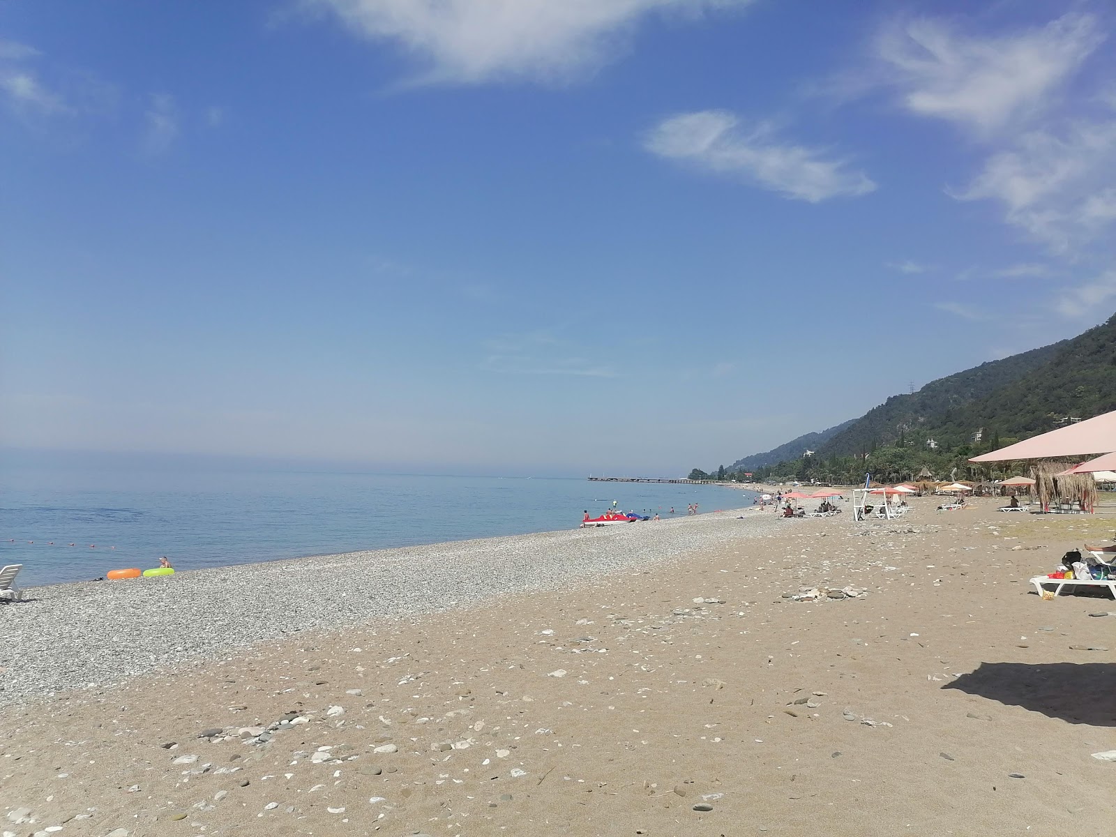 Photo of Gagra beach II with turquoise pure water surface