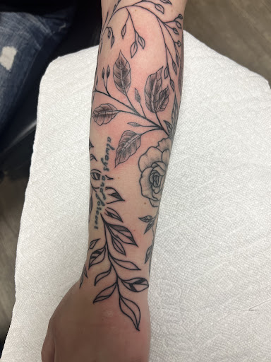 Explore back of forearm tattoo ideas, creative tattoo ideas in Spokane, available at Platinum Rose Tattoo Studio
