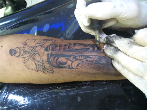 Logo da empresa - Stattoos Tatuagem e piercing