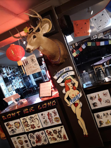 Tattoo Shop «Define Tattoos», reviews and photos, 165 E Aurora Rd, Northfield, OH 44067, USA