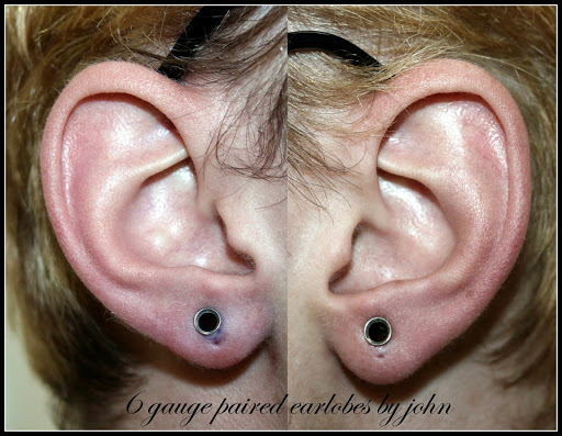 Explore angel and demon tattoo ideas, creative tattoo ideas in Fort Myers, available at Tiger Lotus Tattoo and Piercing