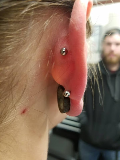 Explore rip tattoos ideas, creative tattoo ideas in Modesto, available at Emerald Tattoo & Piercing - Modesto