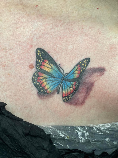 Explore face tattoo ideas for women, creative tattoo ideas in Scott City, available at Distinked Art and Tattoo