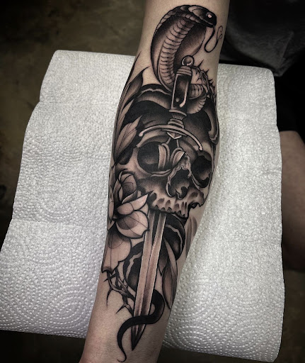 Explore hand tattoo ideas, creative tattoo ideas in Senoia, available at Cornerstone Tattoo Gallery