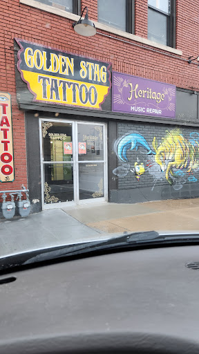 Explore fist bump tattoo ideas, creative tattoo ideas in Kansas City, available at Golden Stag Tattoo and Gallery