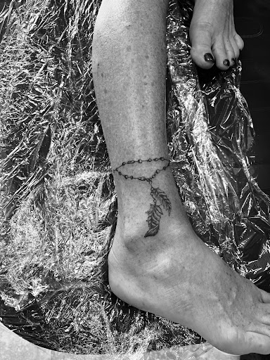 Explore name tattoo ideas wrist, creative tattoo ideas in Seymour, available at American Gypsy Tattoo Corp.