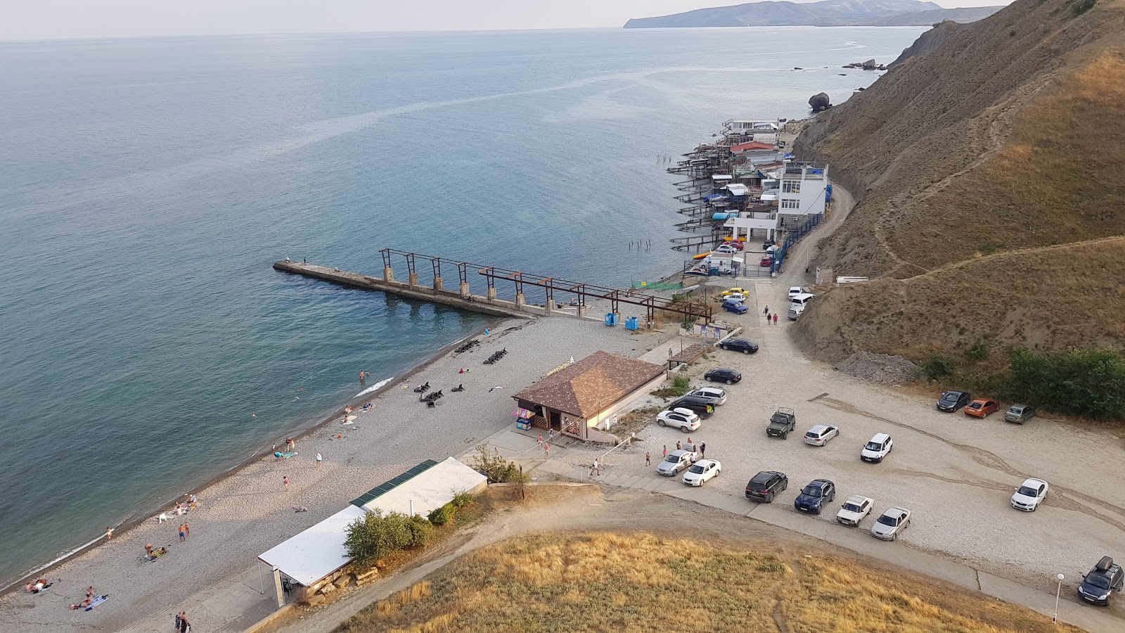 Photo de Tarhib Beach - endroit populaire parmi les connaisseurs de la détente