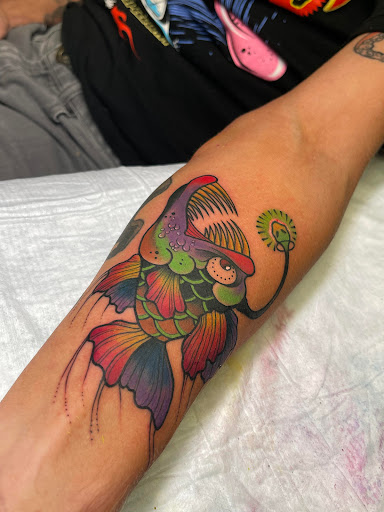 Find cow tattoo ideas for your next unique tattoo in Fort Pierce at Goodfellas Tattoo & Body Piercing