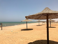 Coral Sea beach'in fotoğrafı geniş bir kıyı şeridi ile birlikte