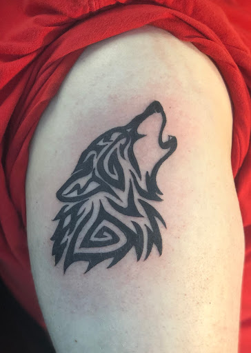 Explore spine tattoo cover up ideas, creative tattoo ideas in Barberton, available at Magic City Tattoo Company