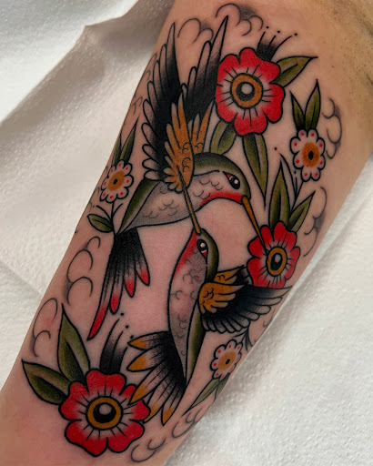 Explore circle of life tattoo ideas, creative tattoo ideas in Lakeland, available at Black Swan Tattoo