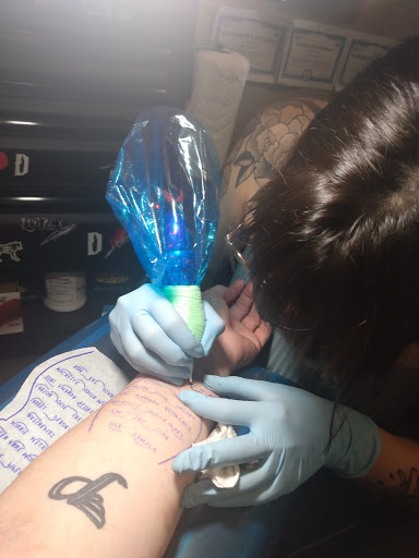 Explore women's wrist tattoo ideas, creative tattoo ideas in Edmond, available at 15th Legion Tattoo & Body Piercing