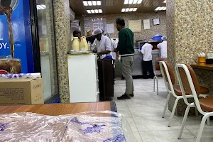 مطعم بستان السعادة image