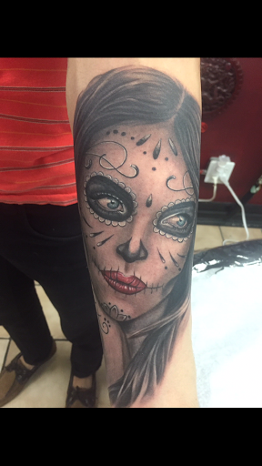 Explore knuckle tattoo ideas, creative tattoo ideas in Tampa, available at Angel Tattoo