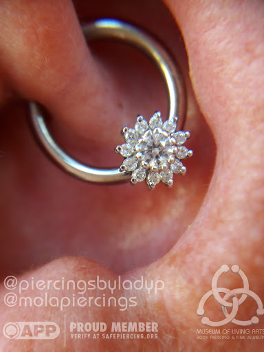 Explore triple moon tattoo ideas, creative tattoo ideas in Charleston, available at MOLA Piercing and Fine Jewelry