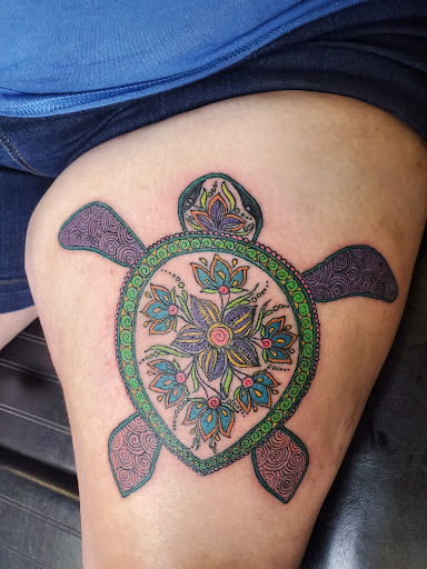 Explore marathon tattoo ideas, creative tattoo ideas in Williamston, available at Lucky Tiger Tattoo studio