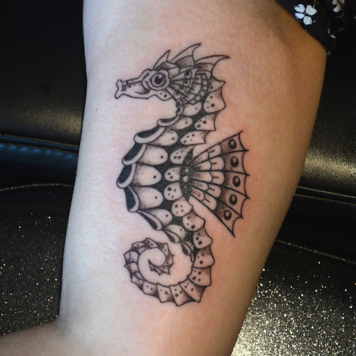 Explore birth flower tattoo ideas, creative tattoo ideas in Rockville, available at Queens Gambit Tattoo