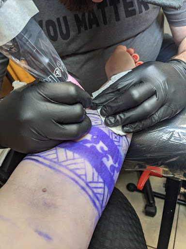 Explore two name tattoo ideas, creative tattoo ideas in Lawrence, available at Skin Illustrations Tattoos & Piercings