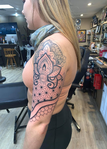 Explore small dragon tattoo ideas, creative tattoo ideas in Ottumwa, available at Family Tradition TattoosPiercings