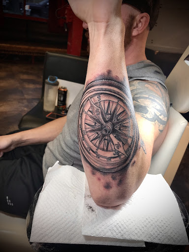 Explore cute flower tattoo ideas, creative tattoo ideas in Lake Charles, available at Brand-X Tattoo & Piercing