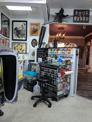 Tattoo Shop «Rabbits Den Tattoo Parlor», reviews and photos, 120 N Main St, Milltown, NJ 08850, USA