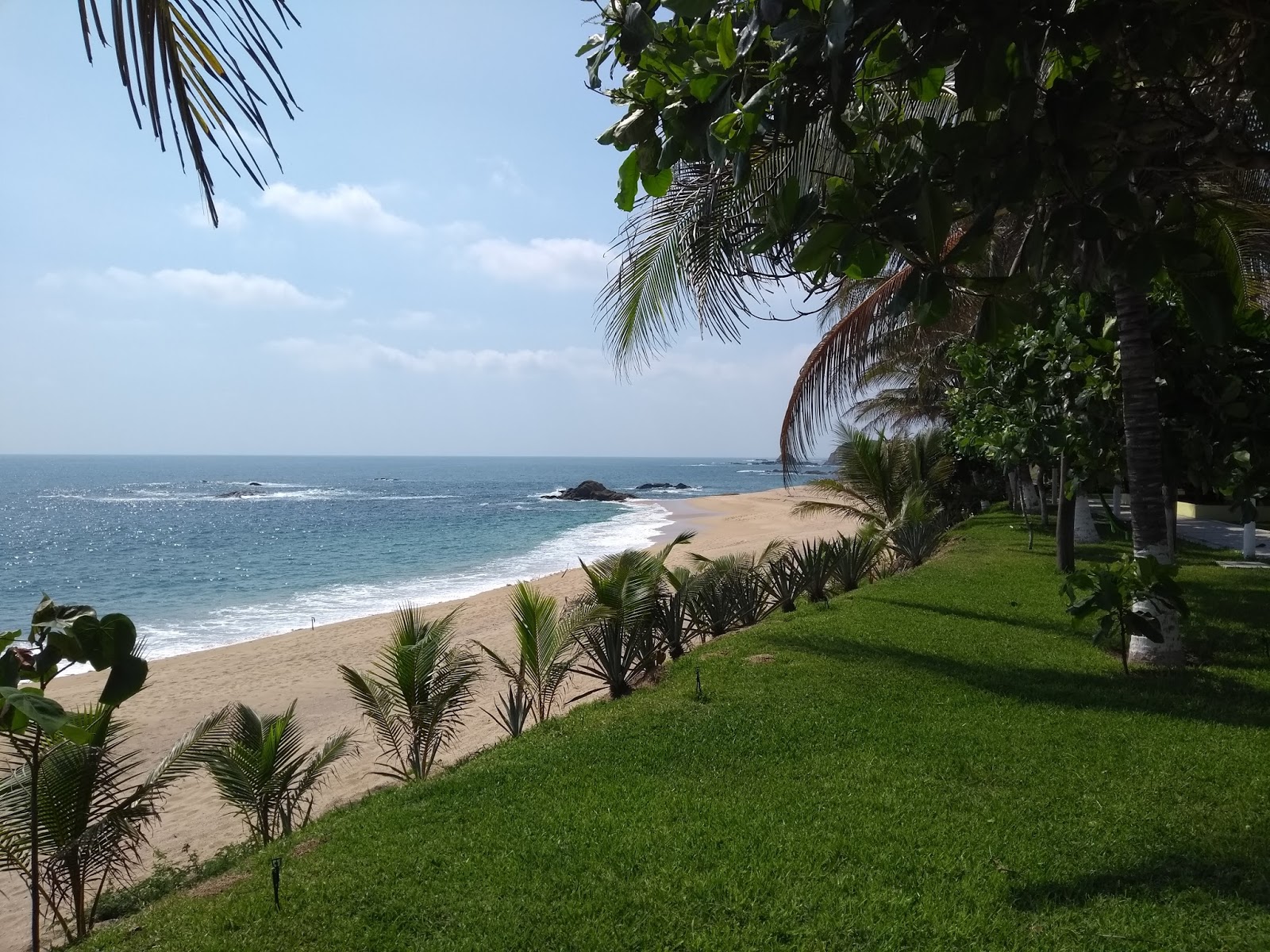 Fotografie cu Playa La Palma Sola și așezarea