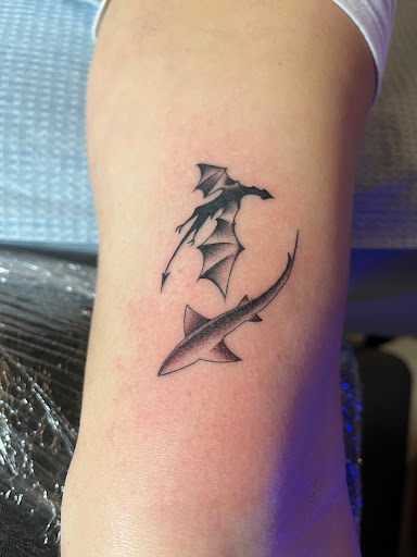 Find tattoo ideas for upper arm men for your next unique tattoo in Cambridge at Choptank Tattoo