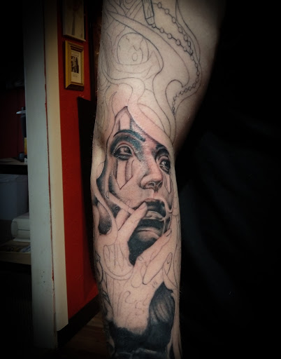 Explore meaningful tattoo ideas for sisters, creative tattoo ideas in Lander, available at Blackblood Tattoo and Piercing