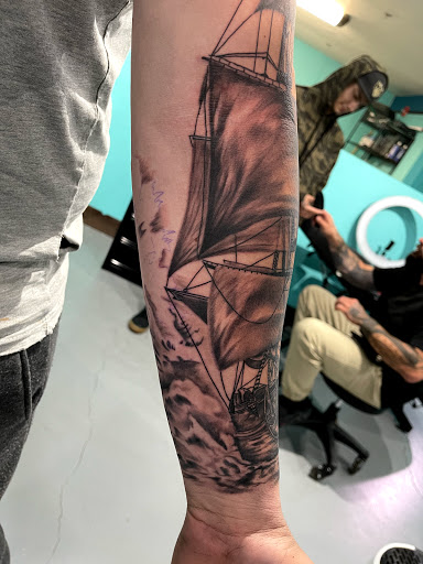 Explore memorial cross tattoo ideas, creative tattoo ideas in Buckeye, available at Irie Art in Ink