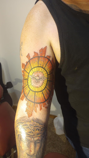 Explore gold tattoo ideas, creative tattoo ideas in Des Moines, available at Adrenaline Studios Tattoo