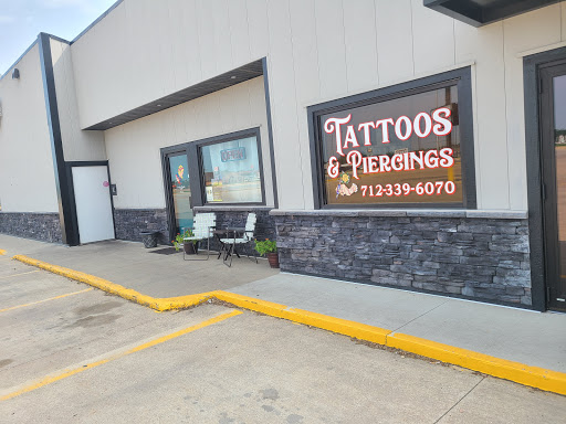 Explore hamsa hand tattoo ideas, creative tattoo ideas in Spirit Lake, available at Painted Ladies Tattoo & Piercing