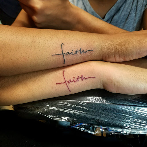 Explore red tattoo ideas, creative tattoo ideas in Raleigh, available at Gifted Styles