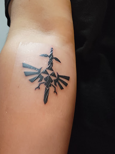 Explore jawline tattoo ideas, creative tattoo ideas in Ocoee, available at Fine Ink Studios Tattoos